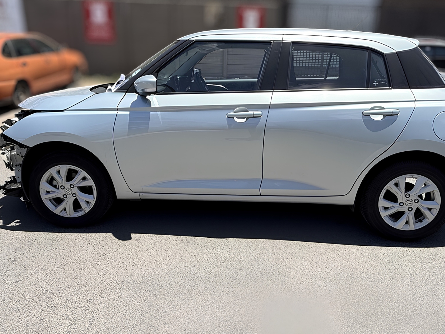 Second-hand OEM front and rear doors sourced for a fourth-generation Suzuki Swift