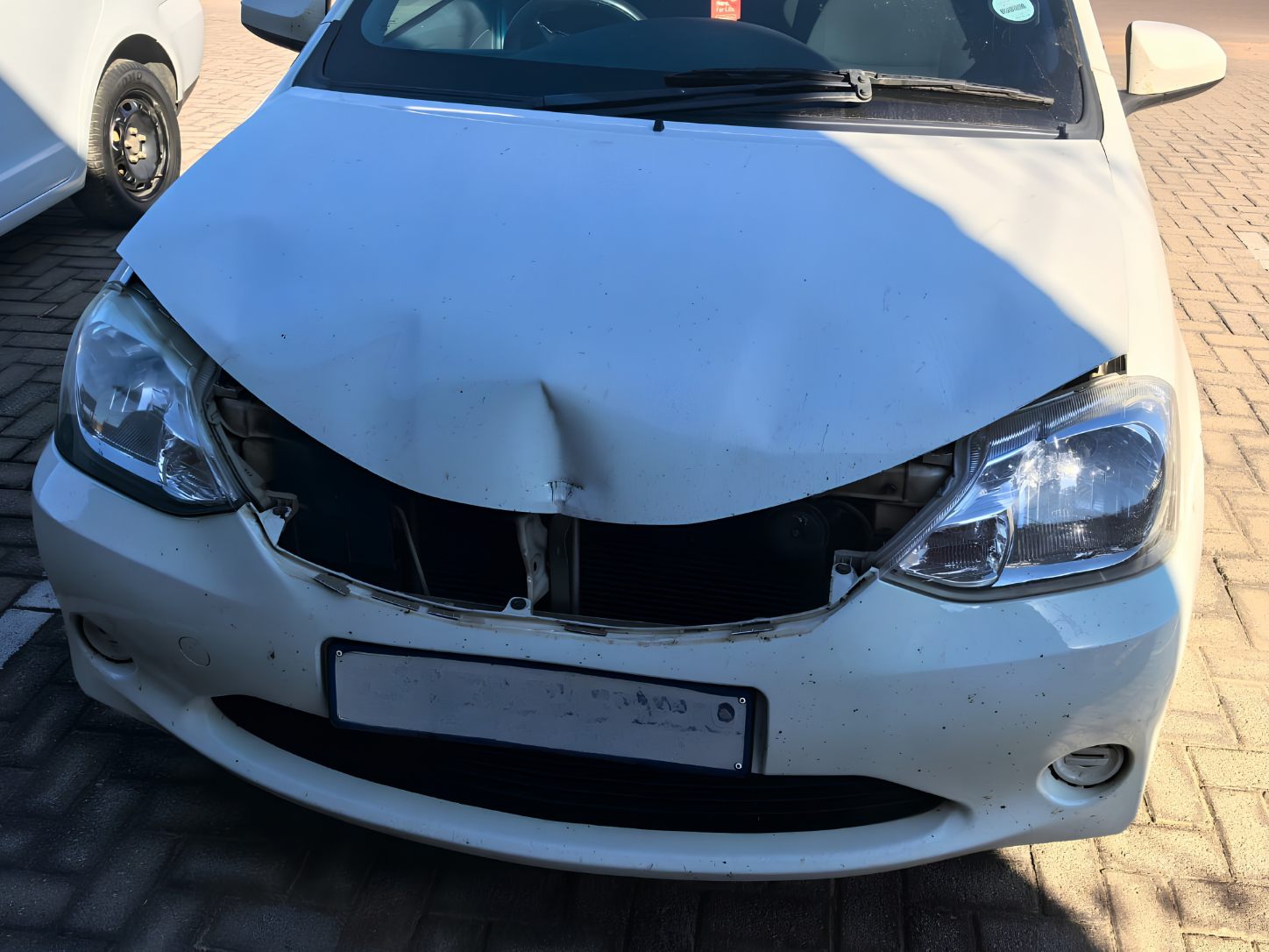 Toyota Etios requiring bonnet grille and hinge replacement parts